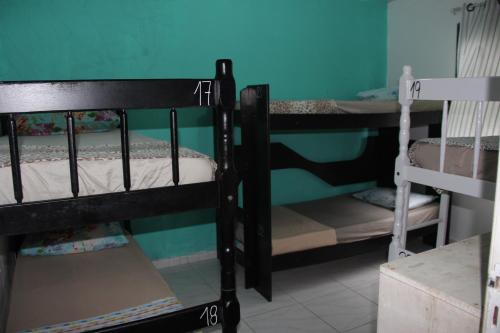 a group of bunk beds in a room at Nosso Lounge Hostel in Florianópolis