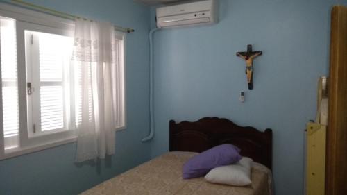 Ένα ή περισσότερα κρεβάτια σε δωμάτιο στο Residencial da Recife