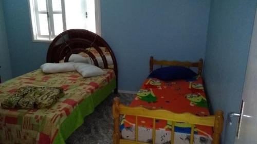 Ένα ή περισσότερα κρεβάτια σε δωμάτιο στο Residencial da Recife