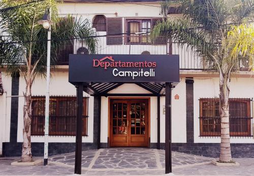 a sign in front of a building at Departamentos Campitelli in General Pacheco