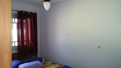 Ένα ή περισσότερα κρεβάτια σε δωμάτιο στο Residencial da Recife
