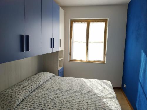 Krevet ili kreveti u jedinici u okviru objekta Vacanza in Ogliastra