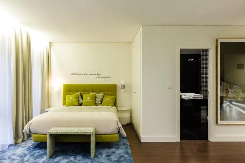 A bed or beds in a room at Porto Old Town – Tourism Apartments