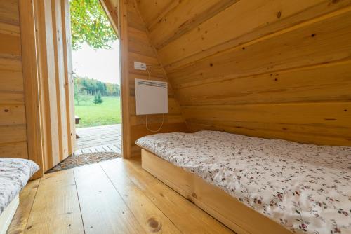Postel nebo postele na pokoji v ubytování Glamping Village - Speleo Camp