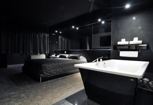 Ванная комната в Complexe Hotelier Le 55