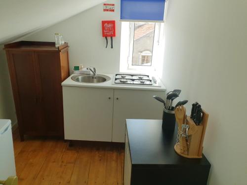 Kuchyň nebo kuchyňský kout v ubytování Casa do Armador