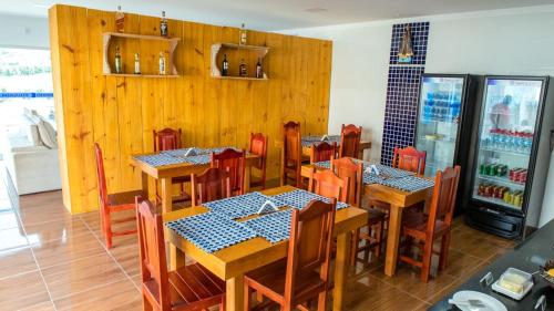 Restaurant o un lloc per menjar a Pousada Carneirinho