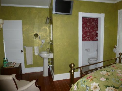 Postel nebo postele na pokoji v ubytování Back INN Time B&B