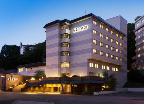 a rendering of the hotel yakushimaakura at night at Yumoto Noboribetsu in Noboribetsu