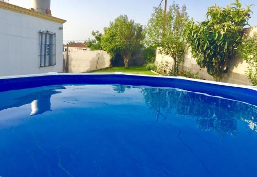 Chalet en Conil, descansa y disfruta BBQ AIRE PISCINA privada PARKING