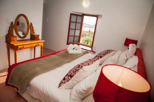 Voodi või voodid majutusasutuse Fisherman's Cottage toas