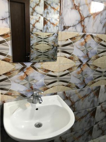 Koupelna v ubytování Guest house BAGRATIONI