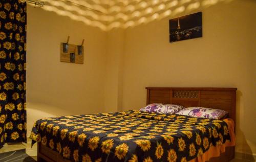 A bed or beds in a room at Jamila cosy apartment