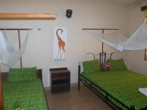 Postel nebo postele na pokoji v ubytování Climbers Home
