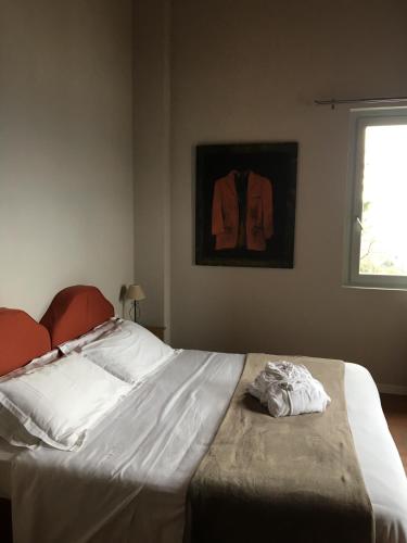 Ένα ή περισσότερα κρεβάτια σε δωμάτιο στο Locanda Pozzetto