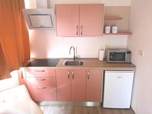 ครัวหรือมุมครัวของ Apartments Grgic