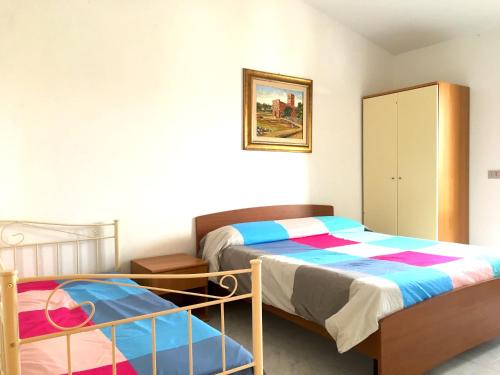 Apartment Andreana tesisinde bir odada yatak veya yataklar