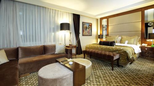 Ένα ή περισσότερα κρεβάτια σε δωμάτιο στο Latanya Hotel Ankara