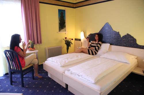 En eller flere senge i et værelse på Erholungshotel Margarethenbad