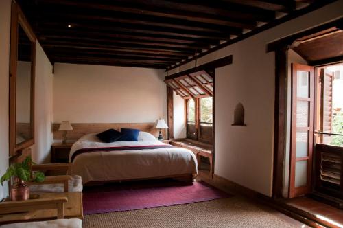 Postel nebo postele na pokoji v ubytování The Inn Patan