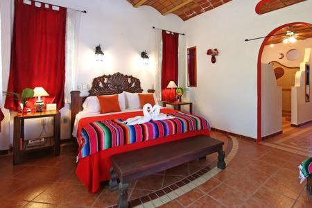 Ένα ή περισσότερα κρεβάτια σε δωμάτιο στο Villas del Corazon - Iguana