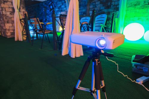a camera on a tripod in front of chairs at Guwol Hotel in Incheon