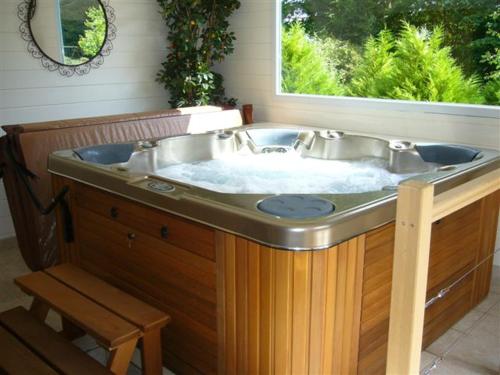 a large sink in a bathroom with a window at Hotel Nuit Et Jour - La Maison de Lucile in Cancale