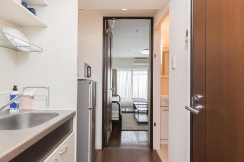 Gallery image of Nanba West Sakuragawa Station Apartment in Osaka