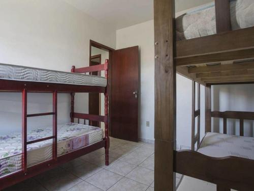 Katil atau katil-katil dalam bilik di Cobertura Duplex na Prainha com Churrasqueira
