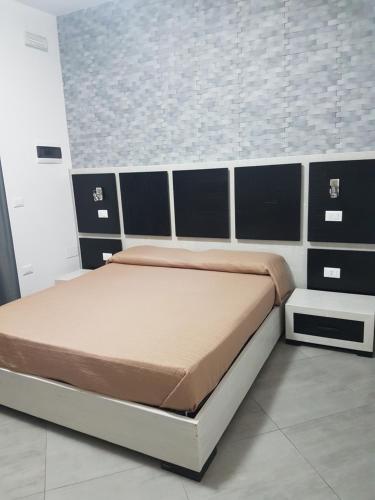 A bed or beds in a room at B&B Il Sole