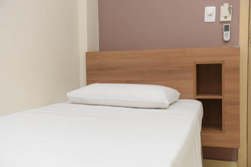 Кровать или кровати в номере Amazônia Palace Hotel