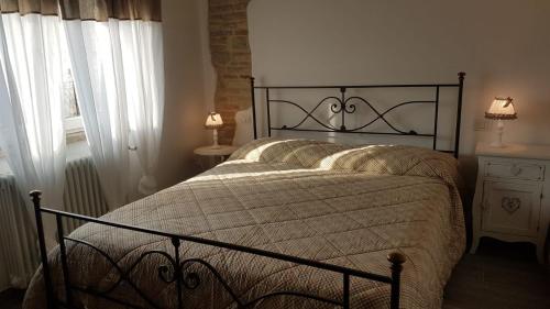 En eller flere senge i et værelse på DOMUS FILMAR