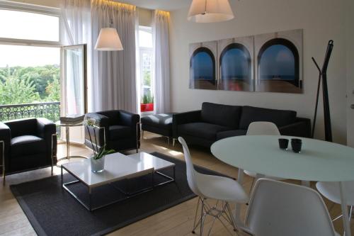 Гостиная зона в Leopold5 Luxe-Design Apartment