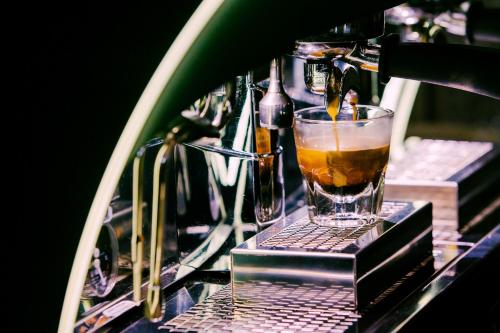 a drink in a glass sitting on a counter at Sofitel Lafayette Square Washington DC in Washington
