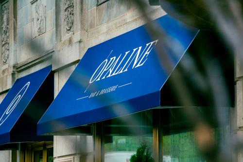 a blue sign on the side of a building at Sofitel Lafayette Square Washington DC in Washington