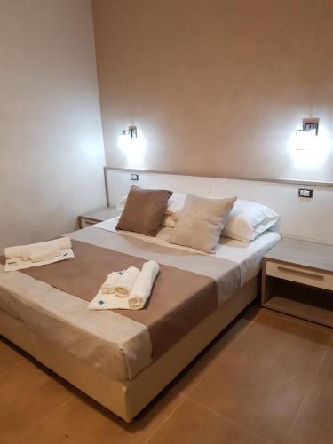 Säng eller sängar i ett rum på "la casa di Martina"