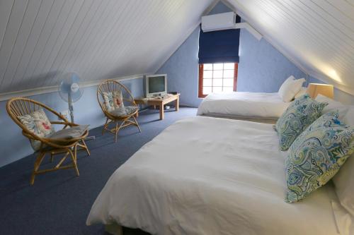 Un pat sau paturi într-o cameră la 33 Berg Selfcatering