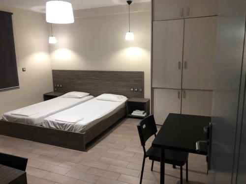 Postel nebo postele na pokoji v ubytování roomotel.com