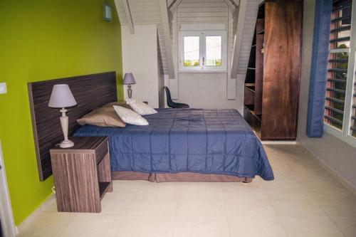 Postel nebo postele na pokoji v ubytování VILLA D'ALICE 1