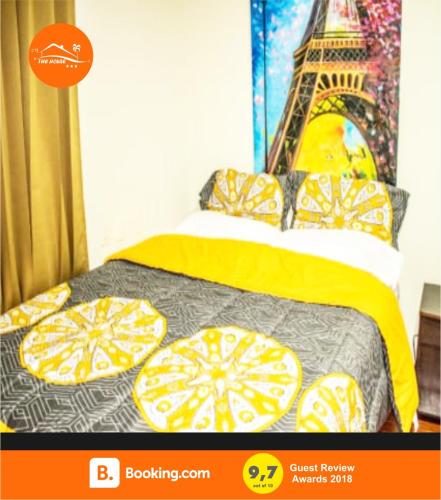 a poster of a bed with lemons on it at The House in Tacna