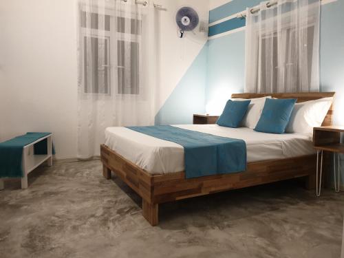 Posteľ alebo postele v izbe v ubytovaní Casa Frangipani Mauritius