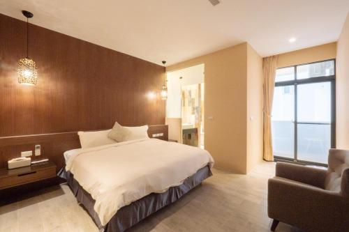 Una cama o camas en una habitación de HUA B&B