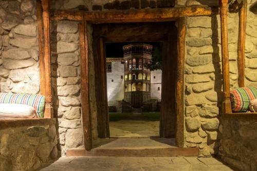 a view of a building through a doorway at Serena Khaplu Palace in Khaplu
