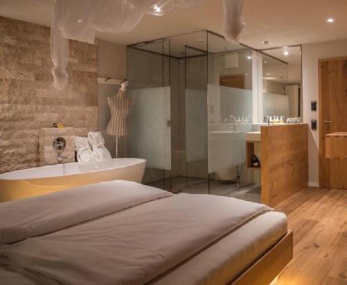 Ένα ή περισσότερα κρεβάτια σε δωμάτιο στο Hotel Waldvogel