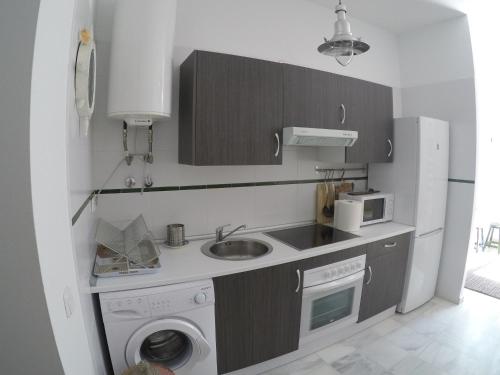 Kuchyň nebo kuchyňský kout v ubytování El Rinconcito - apartamento palacete rehabilitado