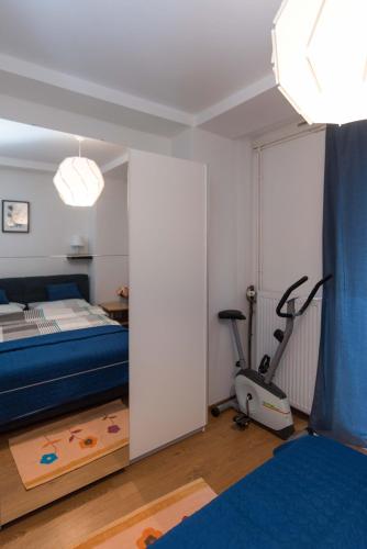 Ένα ή περισσότερα κρεβάτια σε δωμάτιο στο Apartman Lux