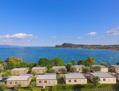 arial view of a residential neighborhood with the water at Campeggio Europa Silvella in San Felice del Benaco