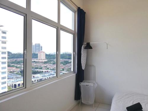 Ένα ή περισσότερα κρεβάτια σε δωμάτιο στο Puchong Skypod Residence, 1-4pax unit, Walking Distance to IOI Mall, 10min Drive to Sunway
