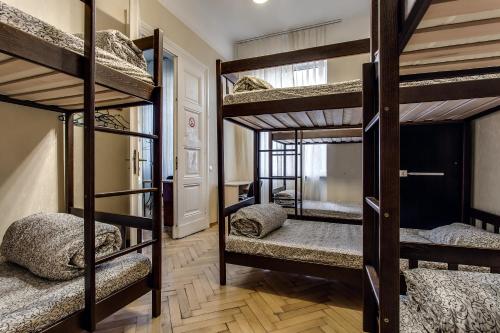 Postel nebo postele na pokoji v ubytování Centrum Hostel