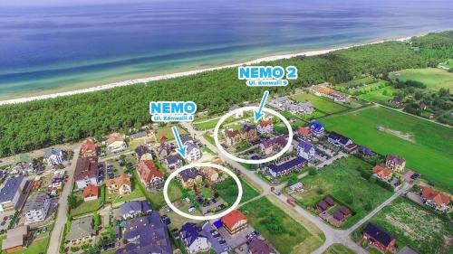 an aerial view of a resort near the beach at Willa Nemo in Karwia